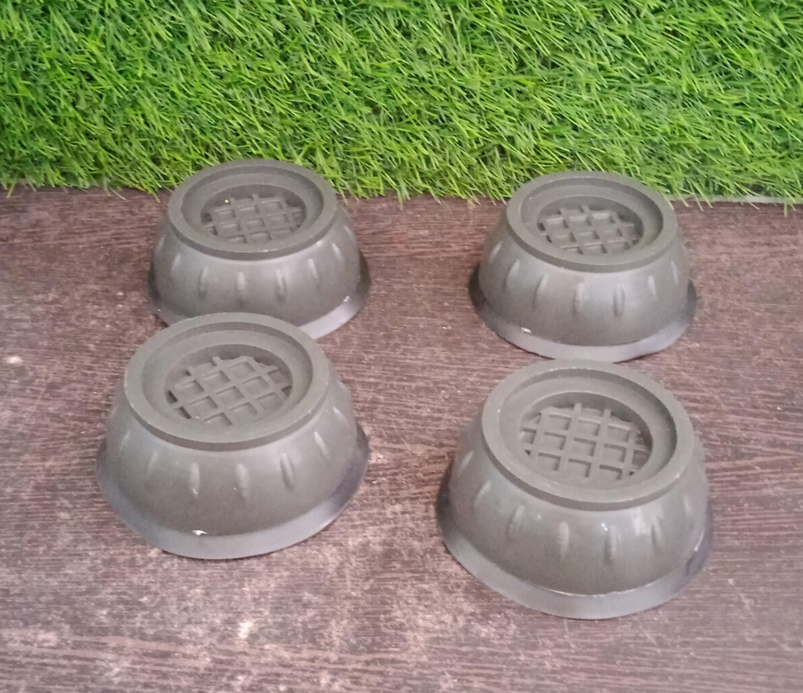 Vibration dampening pads with suction cups